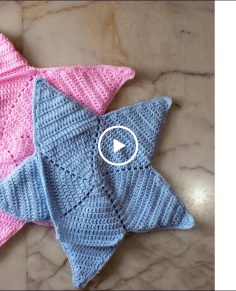 Free crochet pattern: star shaped pocket baby blanket